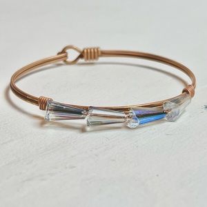 Luca + Danni Gold wire bracelet with light blue reflective jewels size 8/XL